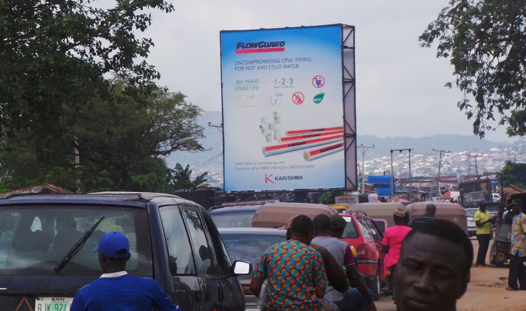 Portrait Billboard By Building Material Market Dei-Dei, Abuja
