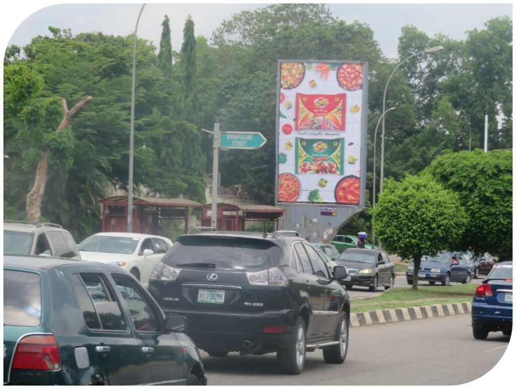 Portrait Billboard At Herbert Macaulay Way By Ladi Kwali Street Junction Wuse, Abuja